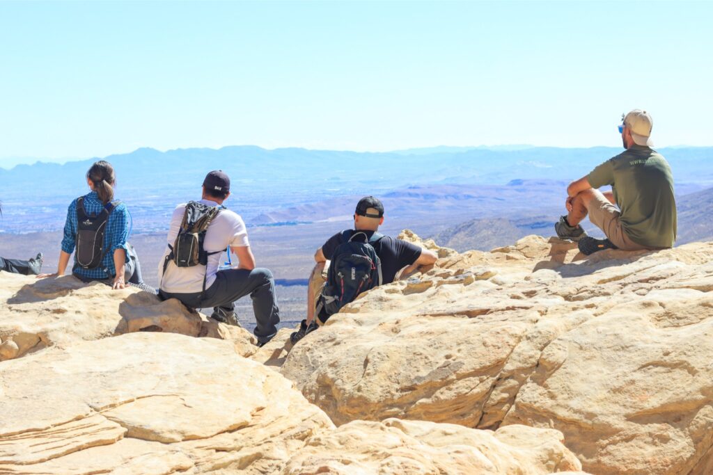 Hikers overlooking from red rock canyon hiking tours